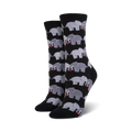 Close-up shot of a pair of black crew socks with a pattern of grey elephants holding hearts.