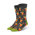 Pair of crew socks with a bloody mary cocktail design.  The socks are dark gray with orange and green accents. 