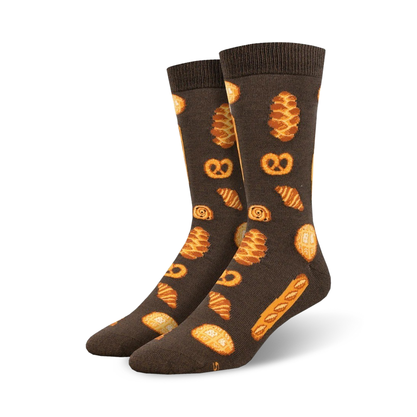 Pair of dark brown crew socks with illustrated pastries: croissants, pretzels, and bread rolls in golden brown hues.