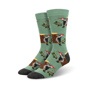 green crew socks with a woodpeckers and tree stump pattern.   