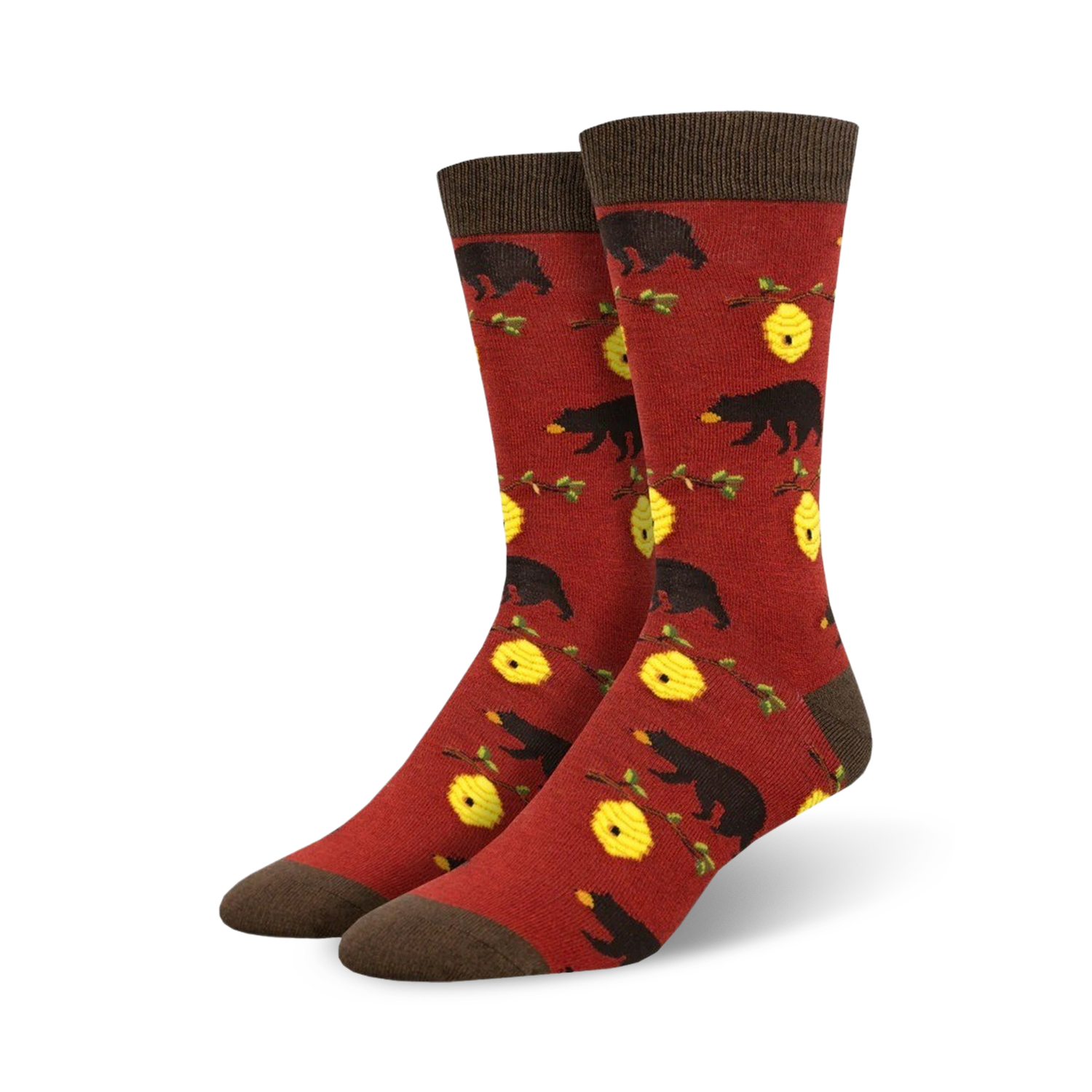 Lifestyle shot of the red Bears and Bees Bamboo socks on a model's feet.