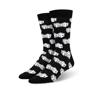 Pair of black bamboo crew socks with a white dice pattern.  The dice are scattered across the socks in a playful design.