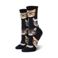 Pair of black crew socks with a repeating pattern of cats wearing glasses.  The cats are orange, tan, and gray.