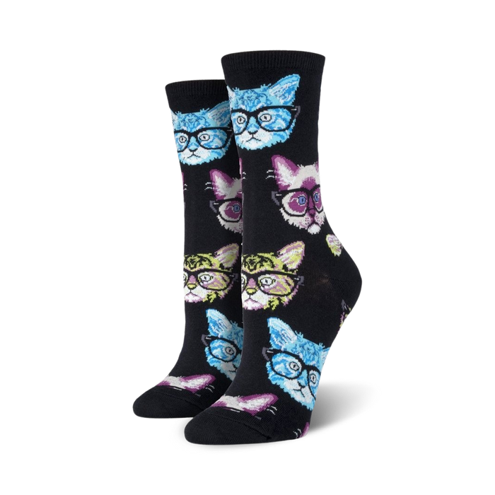 black crew socks with horn-rimmed bespectacled cartoon cats in blue, purple, pink & yellow for women.  