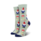 Pair of crew socks, sage green, featuring gnomes, mushrooms, and flowers. 