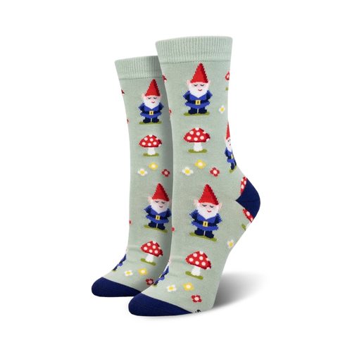 Pair of crew socks, sage green, featuring gnomes, mushrooms, and flowers. 