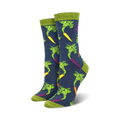 A pair of women's crew socks in navy blue with a colorful carrot pattern.  The carrots are orange, yellow, and purple, with green tops, on a dark blue background.  Lime green cuffs.