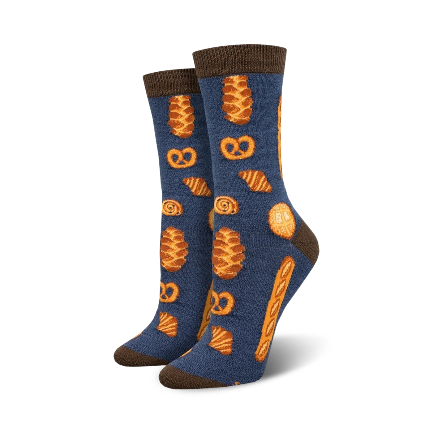 Pair of women's crew socks.  Navy blue with brown-topped cuff. Features repeating pattern of pretzels, croissants, and other baked goods in orange-gold.