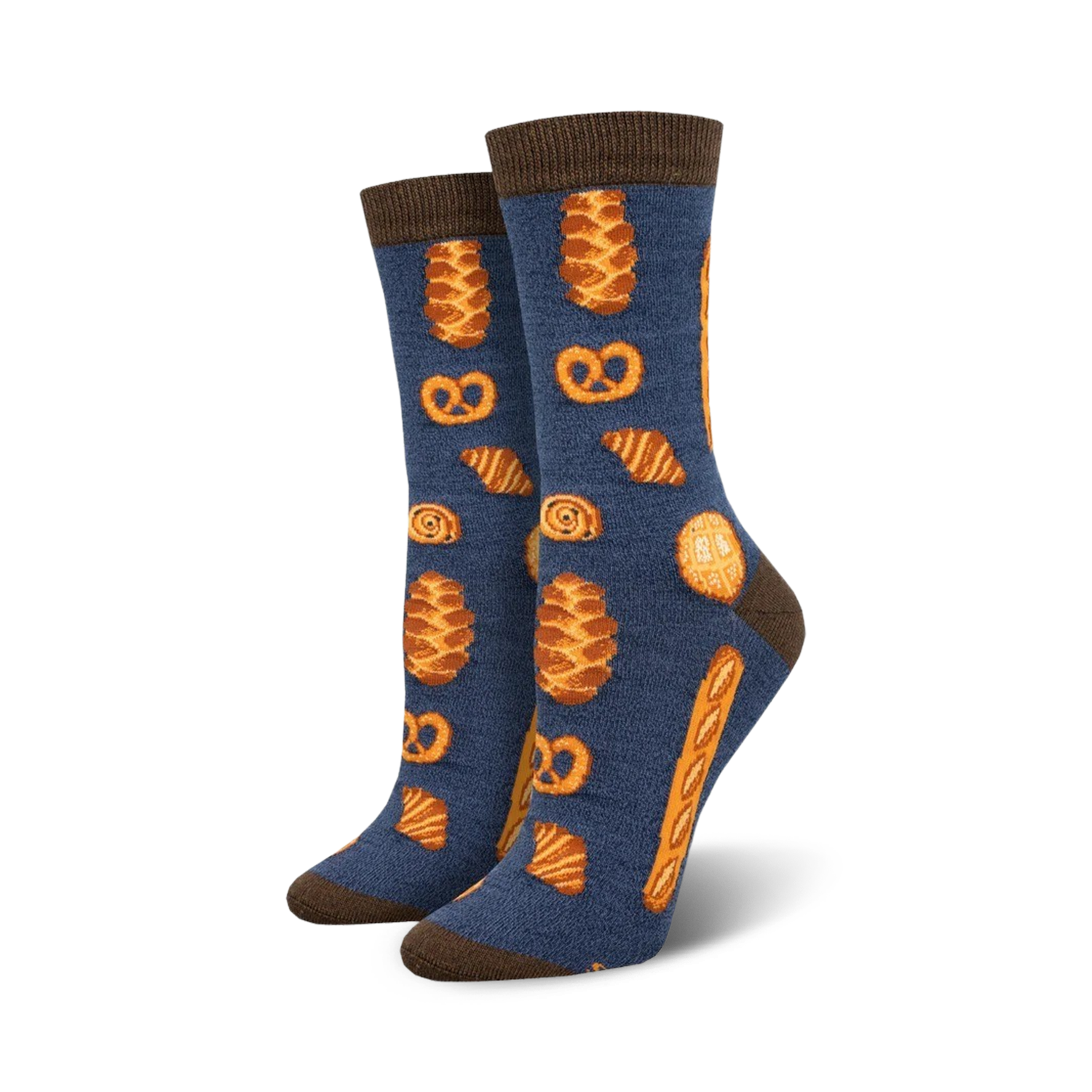 Pair of women's crew socks.  Navy blue with brown-topped cuff. Features repeating pattern of pretzels, croissants, and other baked goods in orange-gold.