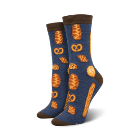 bakery themed crew socks in blue. various baked goods in orange and brown include croissants, pretzels and bread.   
