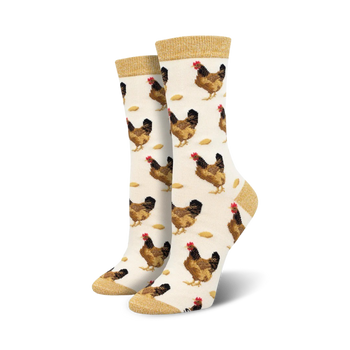 novelty crew socks for women featuring brown hen and egg pattern on cream background with gold accent.  