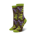 Pair of women's crew socks. Brown and purple blackberry design on a brown background. Green top cuff.