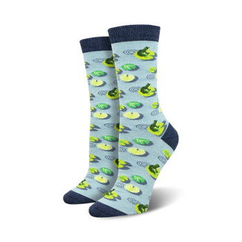 light blue crew socks featuring a pattern of green lily pads and dark green frogs with yellow centers.   