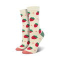 Close-up of Strawberry Delight Bamboo socks in cream color showing strawberry pattern and peach and teal details.