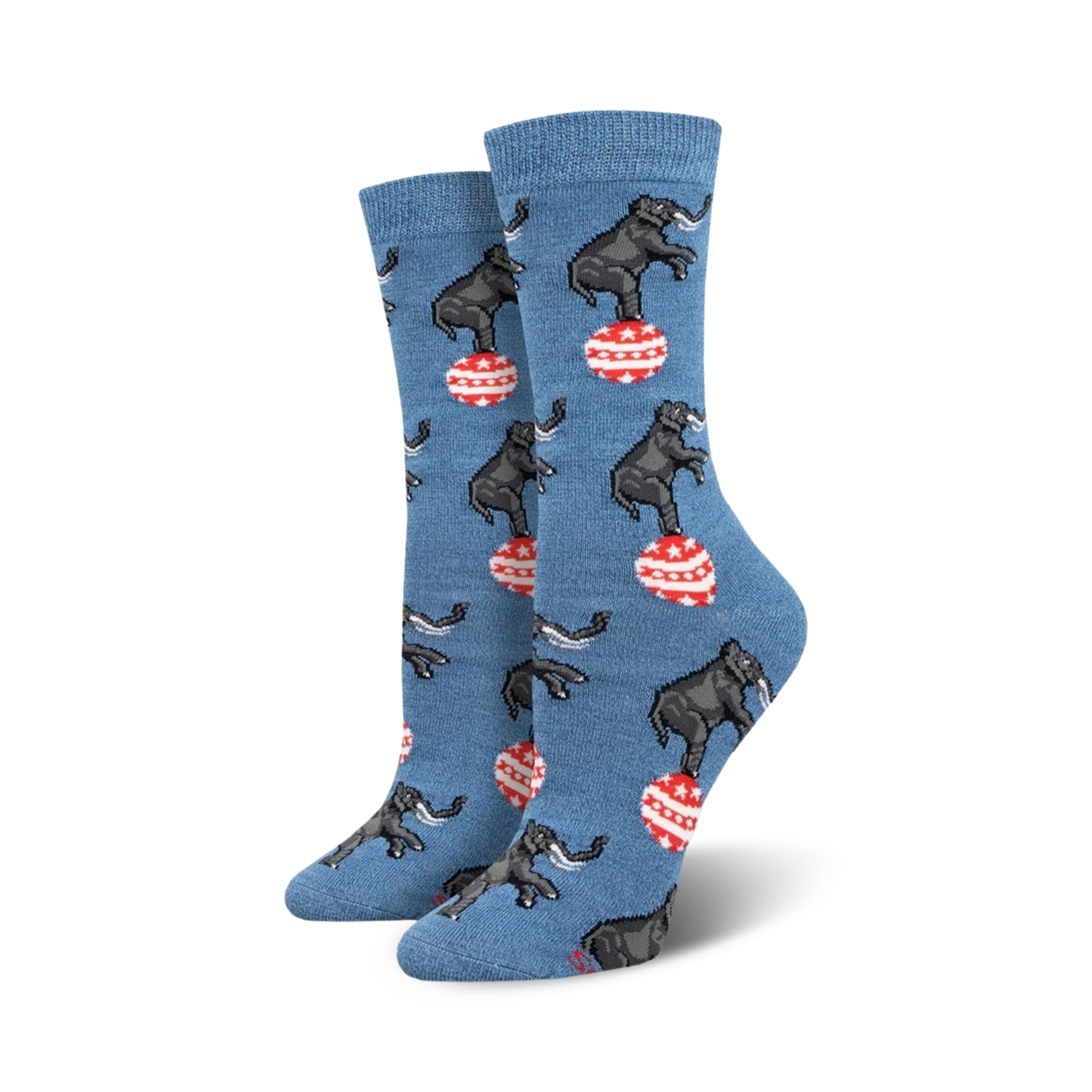 A pair of women's crew socks in blue featuring a pattern of elephants balancing on red and white striped balls.