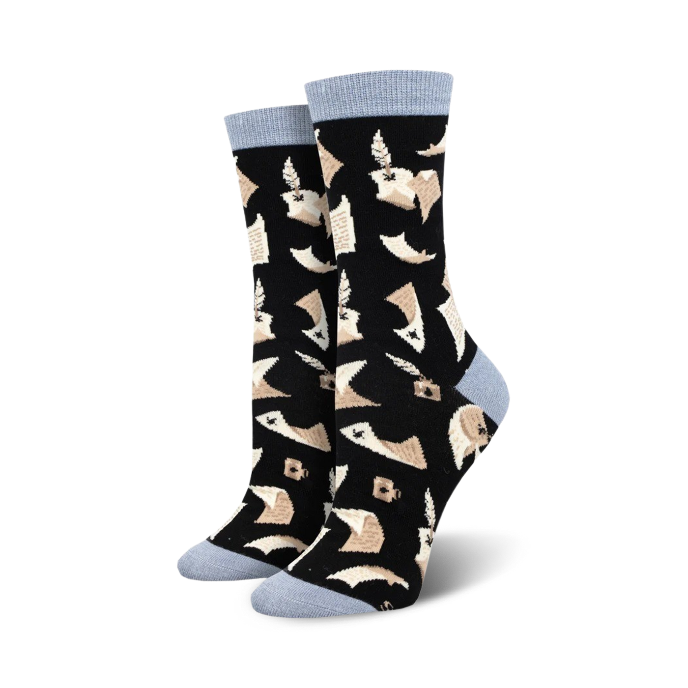 Pair of women's crew socks with a black background and a beige quill and parchment design. The socks have light blue cuffs.