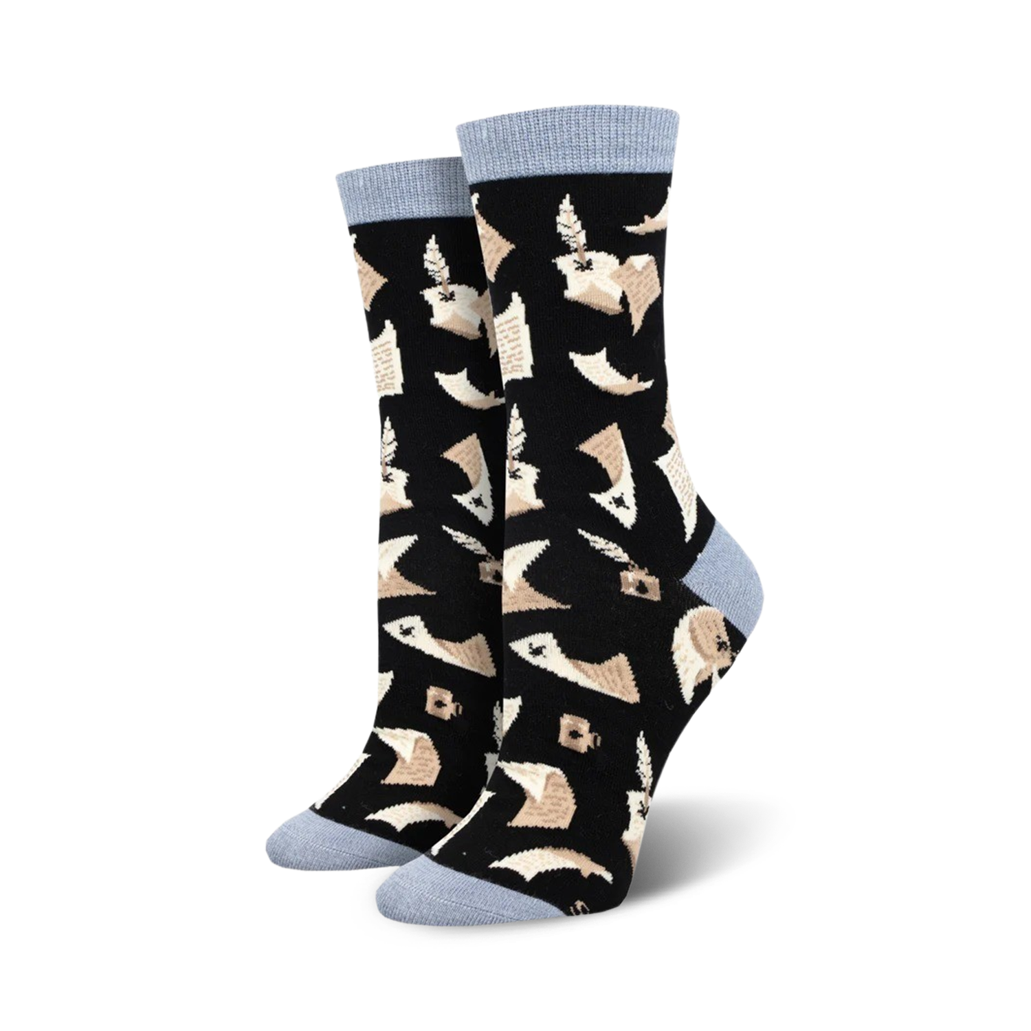 Pair of women's crew socks with a black background and a beige quill and parchment design. The socks have light blue cuffs.