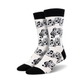 Pair of crew socks in white with a black musical note and clef design. Black cuffs.