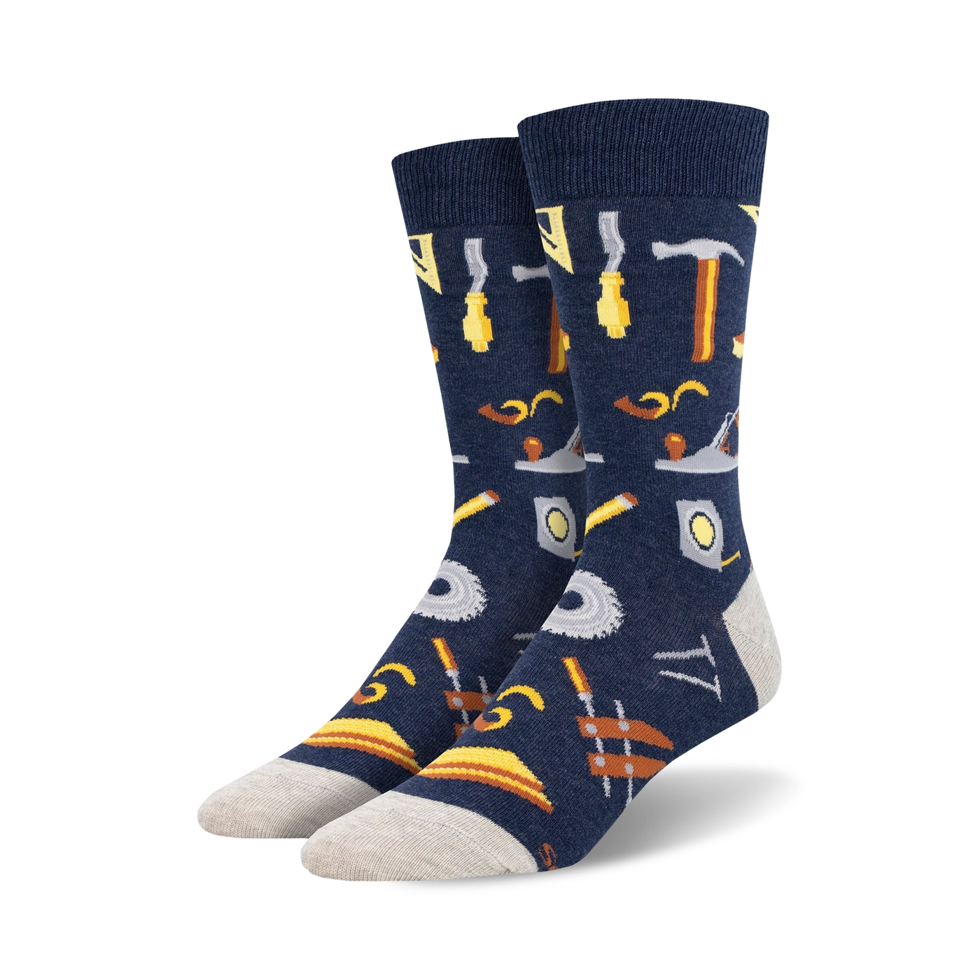 Pair of navy blue crew socks with a pattern of various tools, including hammers, saws, and measuring tools, in yellow and brown.