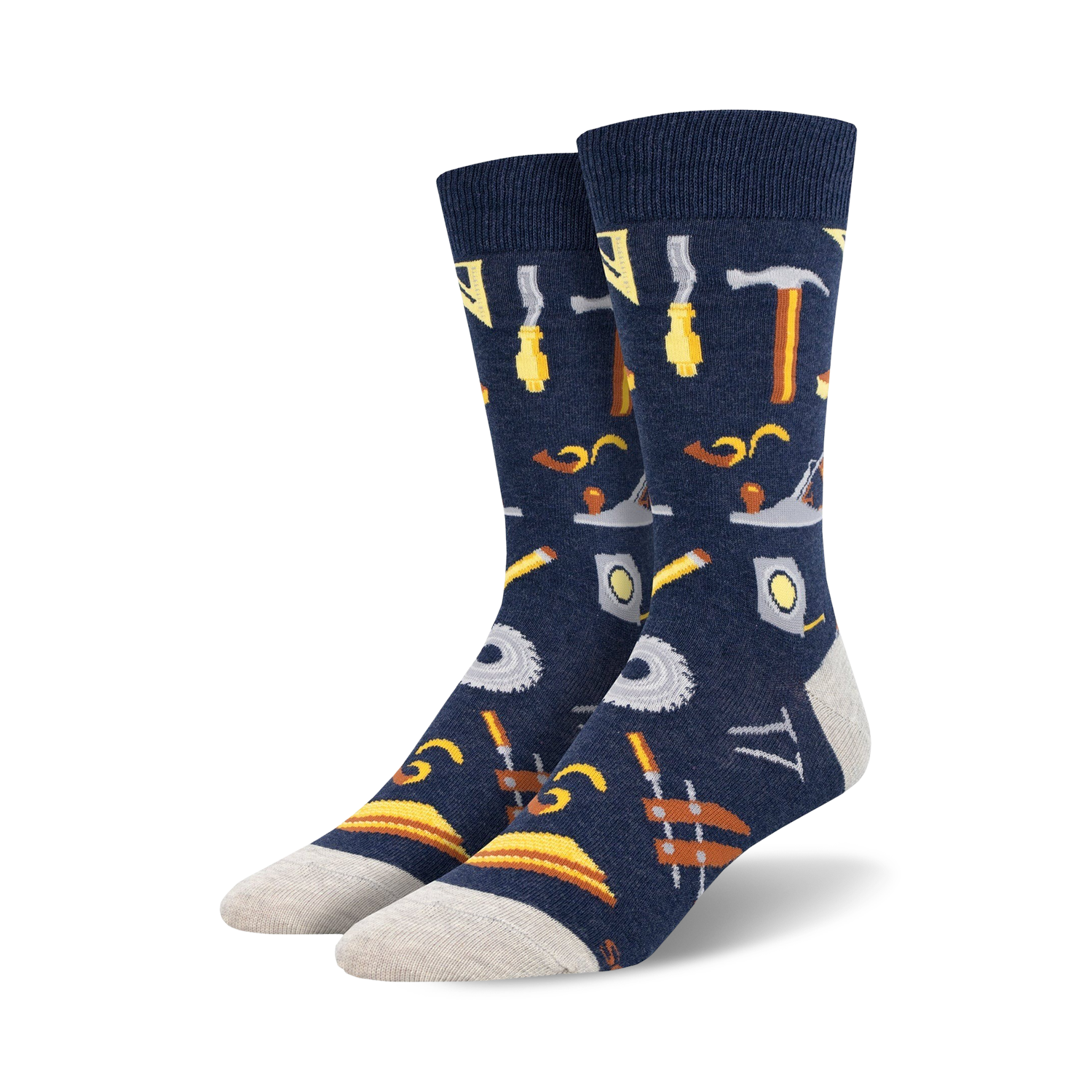 Pair of navy blue crew socks with a pattern of various tools, including hammers, saws, and measuring tools, in yellow and brown.