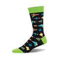 Crew socks in black with a lime green cuff. The design features colorful retro ray guns, lightning bolts, and stars.