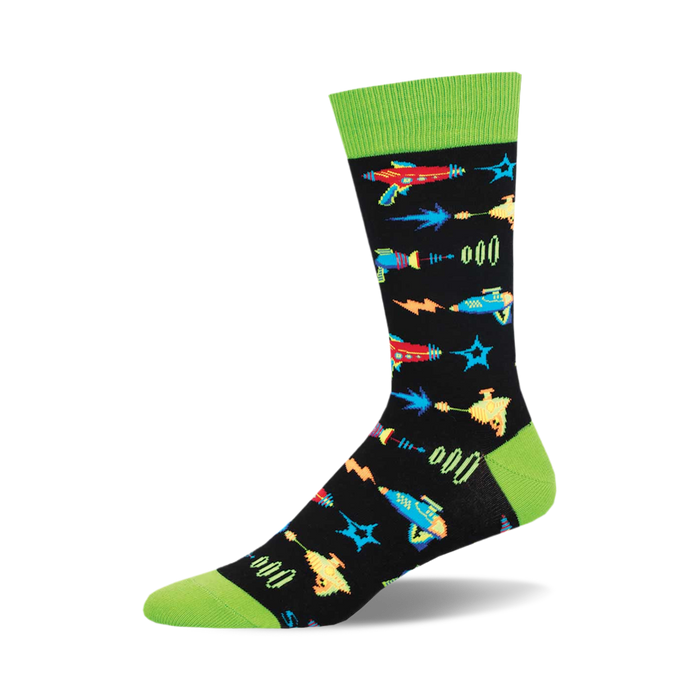 socks that are black with a pattern of colorful pixelated ray guns. the ray guns are in different colors, including red, blue, yellow, and green. socks with a green cuff at the top. }}