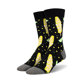 black crew socks with cartoon mexican street corncob and lime wedge pattern.  