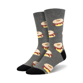 gray crew socks with an allover pattern of cartoonish everything bagel sandwiches with cream cheese.   