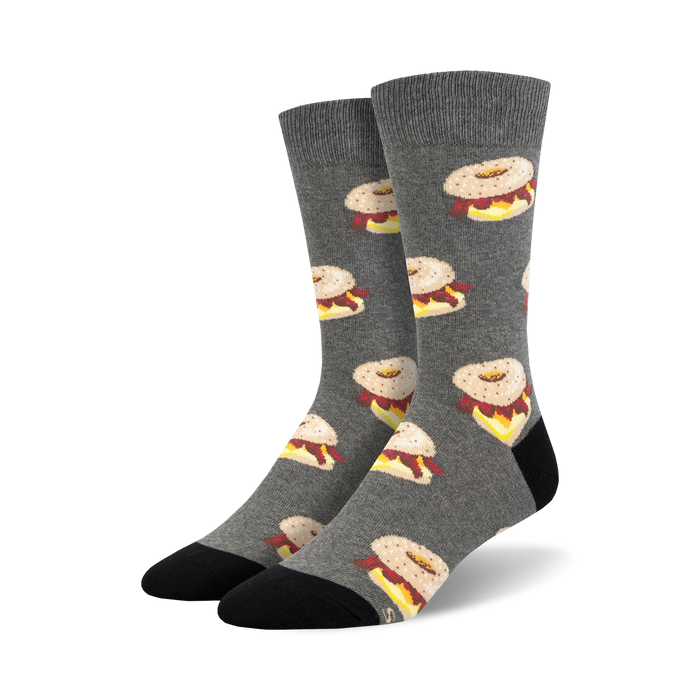 gray crew socks with an allover pattern of cartoonish everything bagel sandwiches with cream cheese.    }}