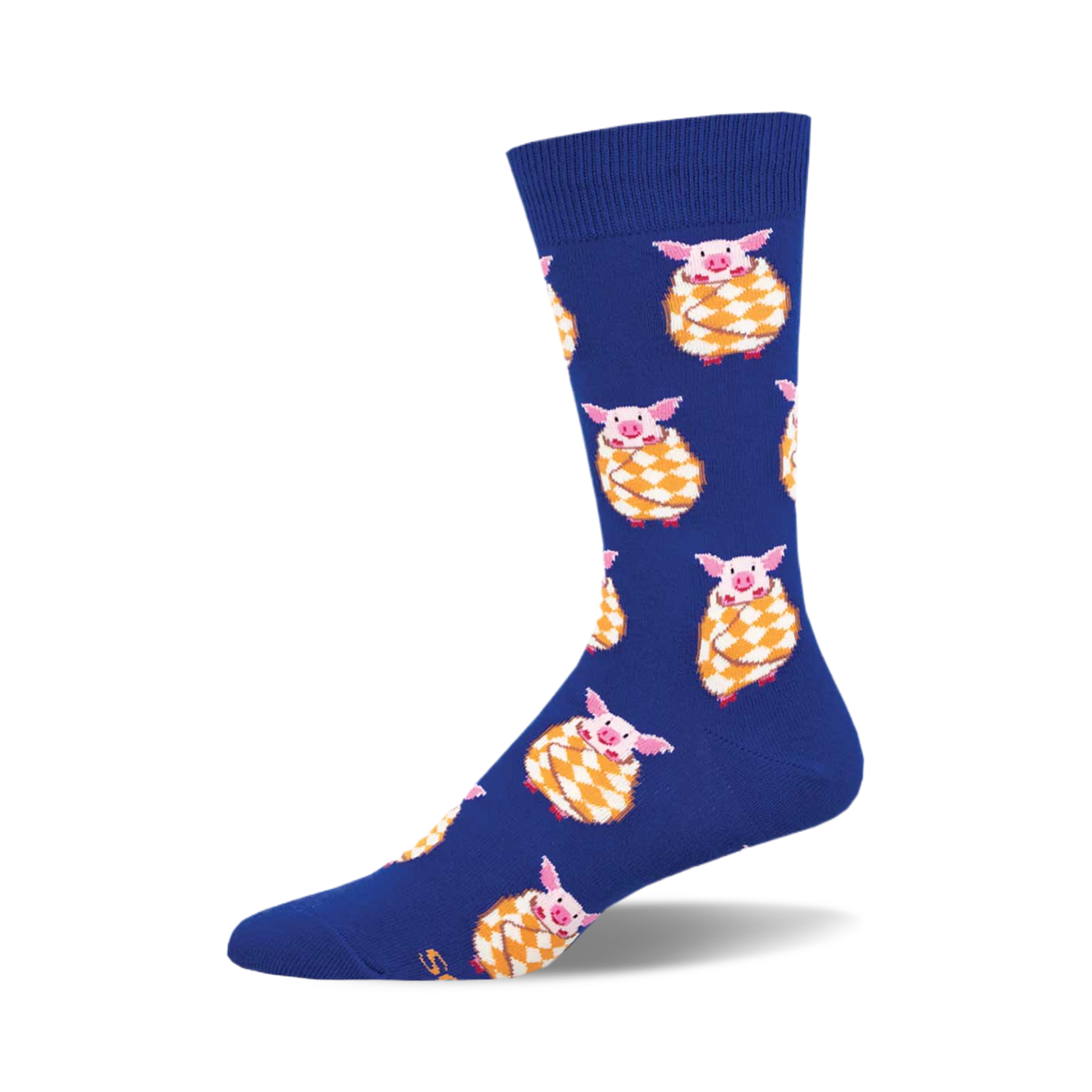 Crew socks in royal blue featuring a pattern of pink pigs wrapped in yellow and orange blankets.