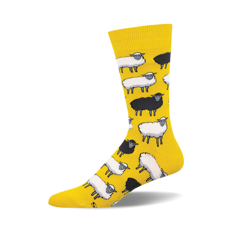 Crew socks featuring a pattern of black and white sheep on a yellow background. 