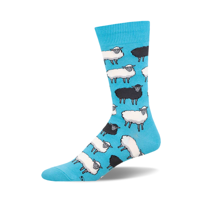 socks that are blue with a pattern of black and white sheep.