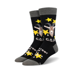 A pair of black crew socks with a goat design, gold stars, and 'G.O.A.T.' text.  The socks have a grey cuff.