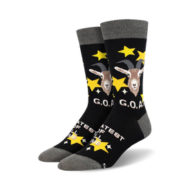 mens black crew socks with yellow stars, cartoon goat wearing party hat, "greatest of all time" text.   