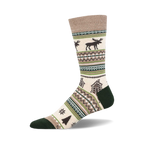 Cream crew socks with a Fair Isle pattern. Features brown moose, green cabins, and snowflake accents on a beige background with green and brown stripes.