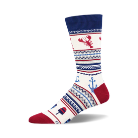 the white sock has a pattern of red lobsters, blue anchors, and red and blue ice cream cones.