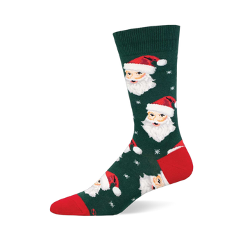 Dark green Christmas sock featuring multiple Santa Claus faces with red hats & white beards, plus white snowflakes. Red toe &