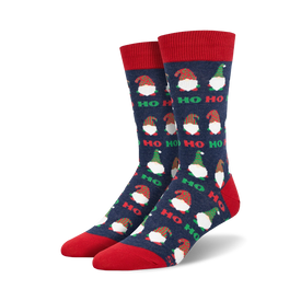 blue crew socks with allover pattern of cartoon gnomes wearing santa hats. perfect for christmas enthusiasts and pun lovers.   