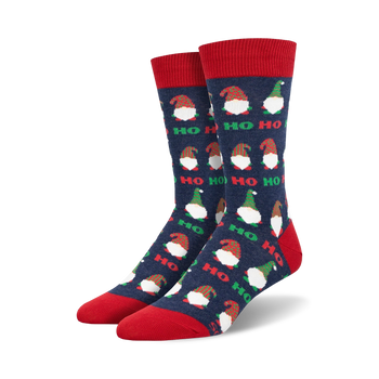 blue crew socks with allover pattern of cartoon gnomes wearing santa hats. perfect for christmas enthusiasts and pun lovers.   