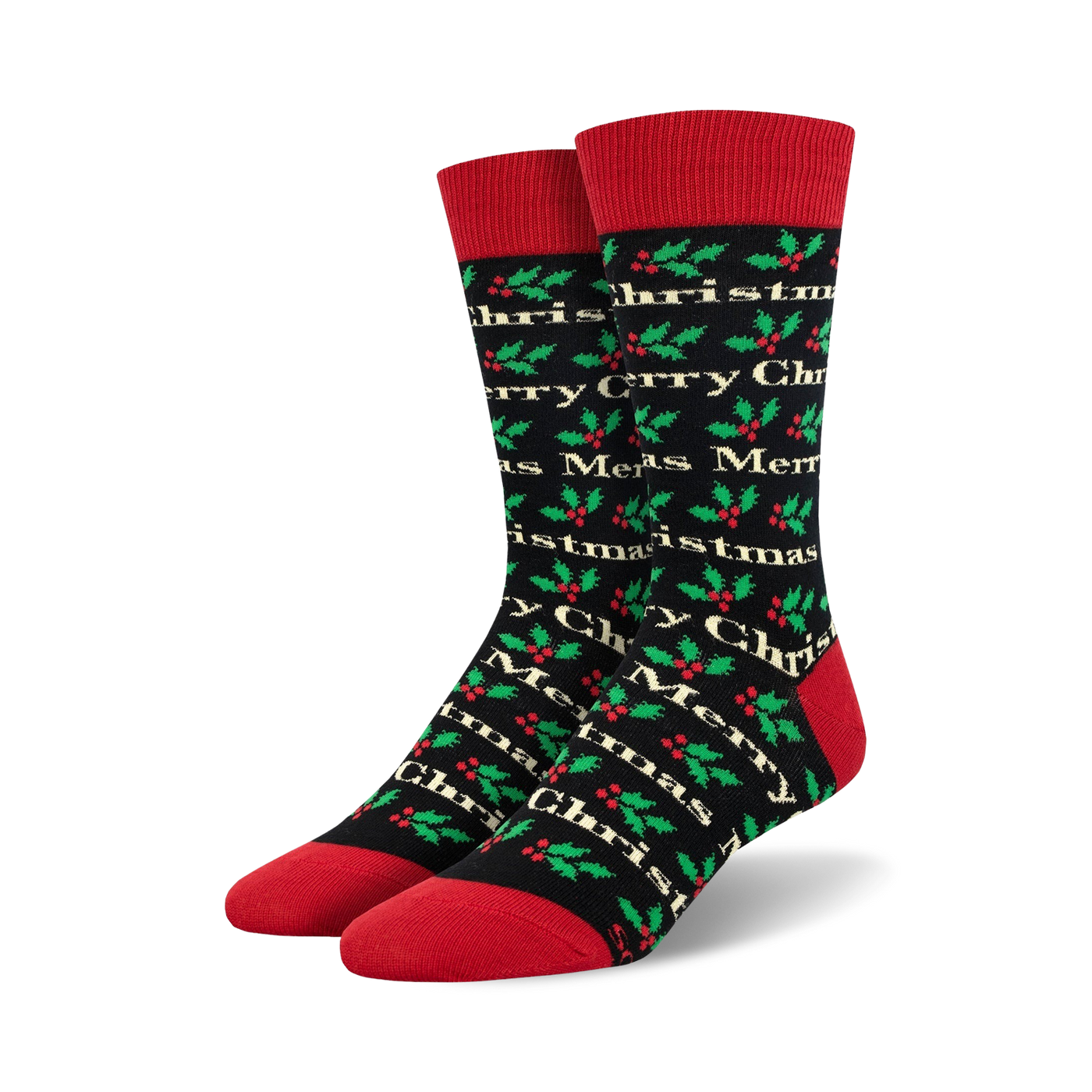 Pair of crew socks in black with a red cuff. The socks have a pattern of 'Merry Christmas' text and holly sprigs in green and red.