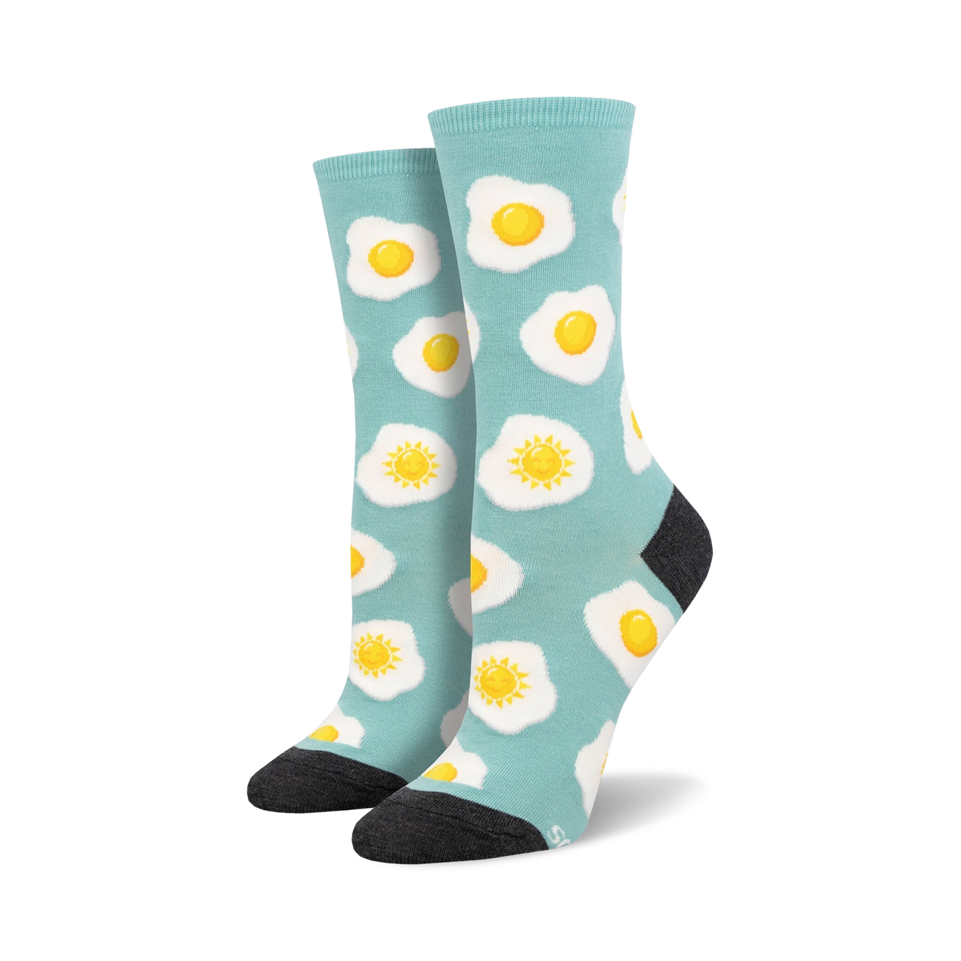 Pair of teal crew socks with a repeating pattern of sunny-side up fried eggs.  Yellow yolks and white egg whites on a light teal background.  Dark grey heel and toe.