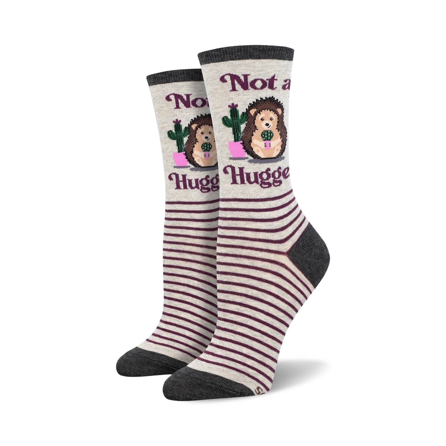 Pair of women's crew socks. Grey and burgundy stripes. Features a hedgehog holding a cactus and the text 'Not a Hugger'.