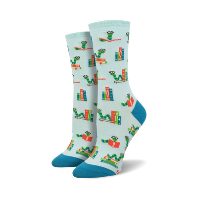 Pair of crew socks; light blue background, teal accents; features design of book-reading worms and stacks of books.