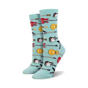 light blue crew socks for women adorned with a vibrant pattern of red, yellow, and brown electric and acoustic guitars.   