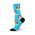 Bright blue sock with cute winter penguins wearing colorful hats & scarves, standing on snow patches with white snowflakes. B