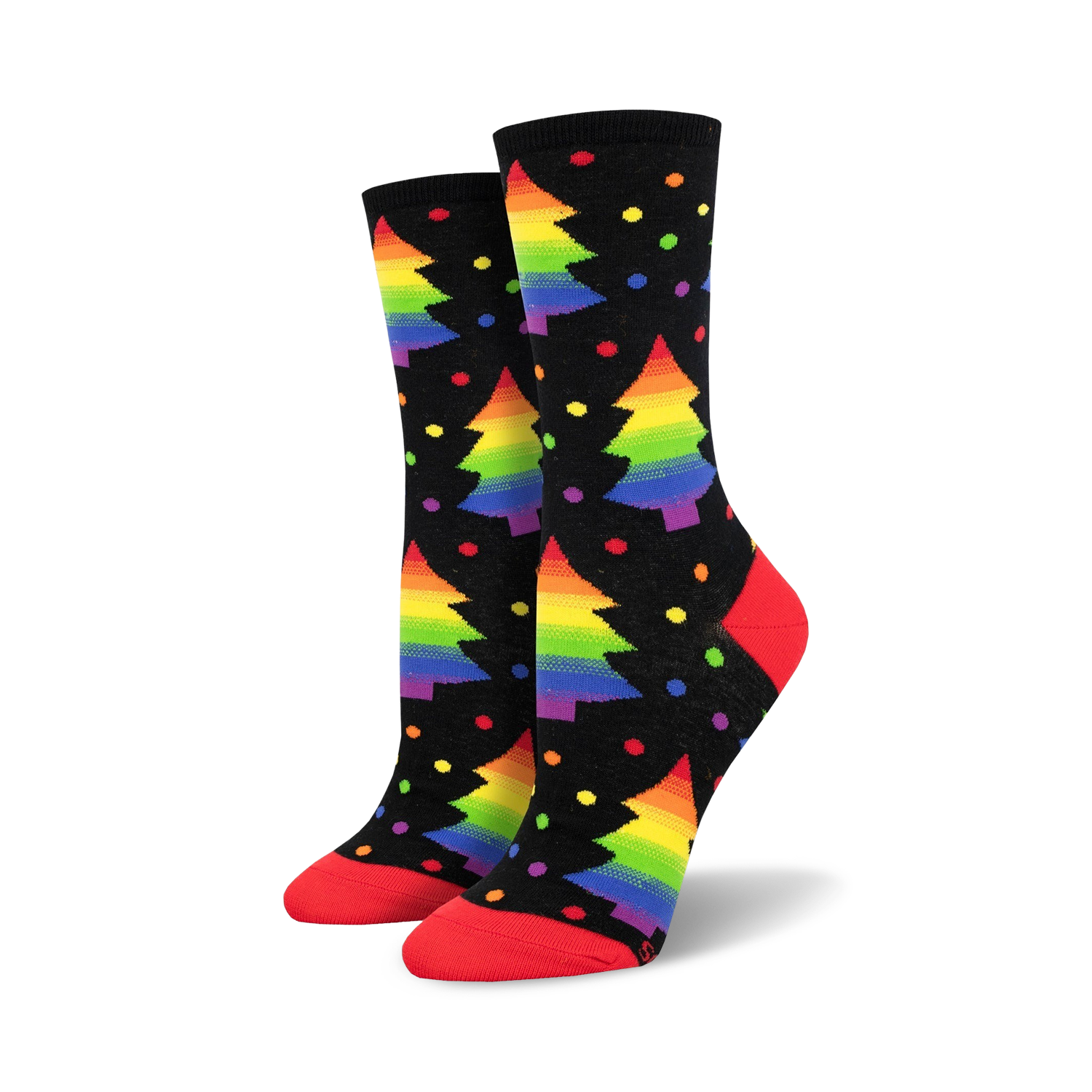 Pair of crew socks on black background.  Rainbow Christmas trees and colorful dots decorate the socks, which have red cuffs.