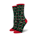 Pair of crew socks in black and red, or cream and green, with a repeating 'Merry Christmas' and holly pattern.