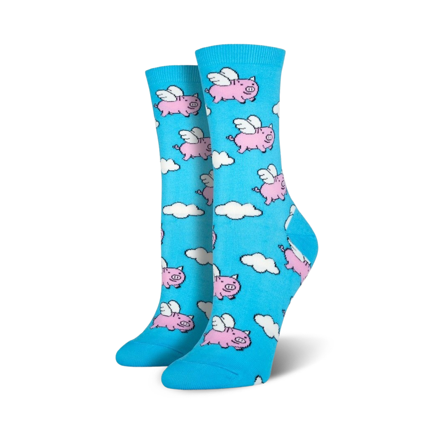 Pair of women's crew socks in light blue. The socks feature a whimsical pattern of pink pigs with wings flying amidst white clouds.