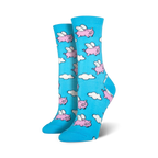 Pair of women's crew socks in light blue. The socks feature a whimsical pattern of pink pigs with wings flying amidst white clouds.