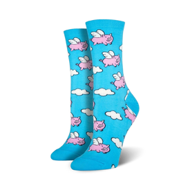 blue crew socks for women featuring a pattern of pink pigs flying through white clouds.  
